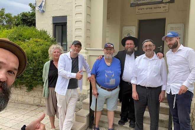Noahides visit the Mishkan Shalom synagogue of Rabbi Bentsion Gagula, third from right, in Haifa on May 12, 2025. Photo credit: called the Embassy of the Nation of Ephraim.