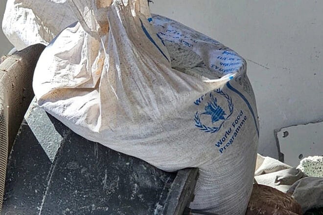 Explosive devices planted in UNRWA bags, found by IDF troops in what was previously a school in the Shejaiya neighborhood of Gaza City. Credit: IDF.