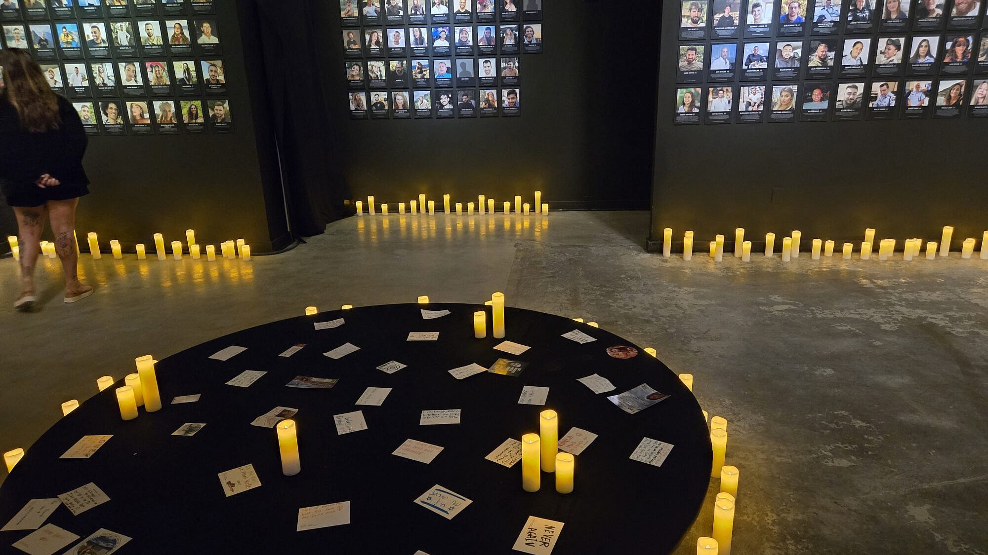 A room with pictures of and memorial candles for 411 victims in the Nova Exhibition: The Moment Music Stood Still, which opened in Washington, D.C., on June 14, 2025. Photo by Jonathan D. Salant.