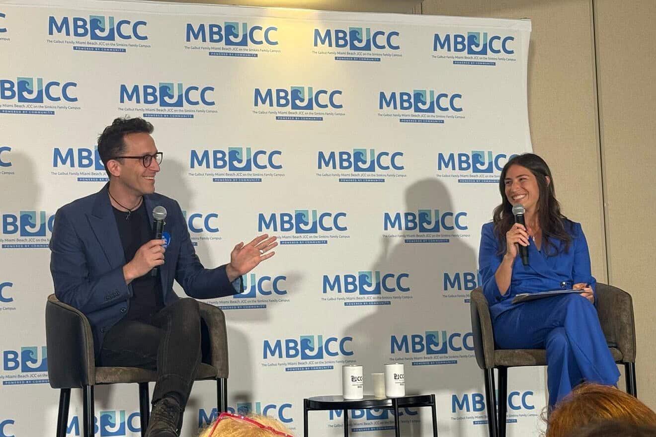 Deedee Bitran, senior counsel and director of the pro bono network at the Saidoff Legal Department at StandWithUs, and Shai Davidai, an aqssistant professor of business at Columbia University, speak at an event in Miami Beach, Fla., on May 5, 2025. Credit: Courtesy of Deedee Bitran.