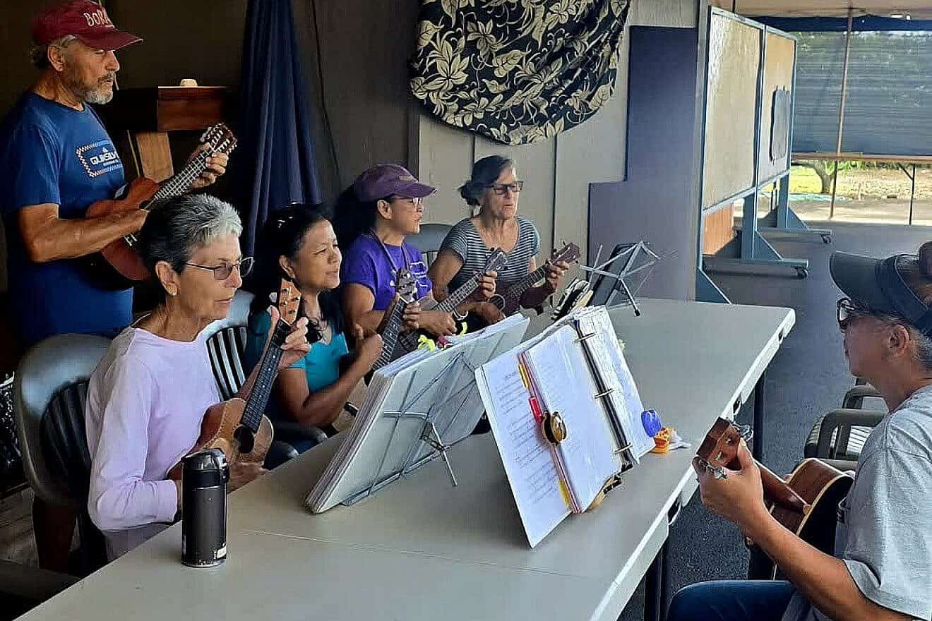 Volunteer ukulele players perform in Kauai, Hawaii. Credit: Courtesy of Jewish Community Services of Hawaii.