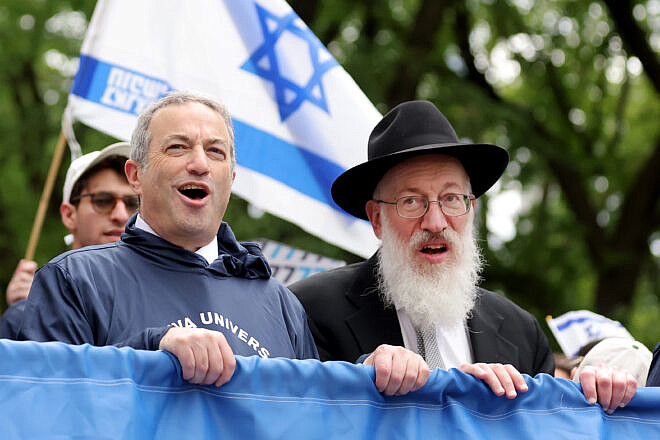 Rabbi Ari Berman (left), president of Yeshiva University, and Rabbi Mordechai Willig, one of yeshiva's senior rabbis, march at the Israel Day Parade on May 18, 2025. Credit: Yeshiva University.