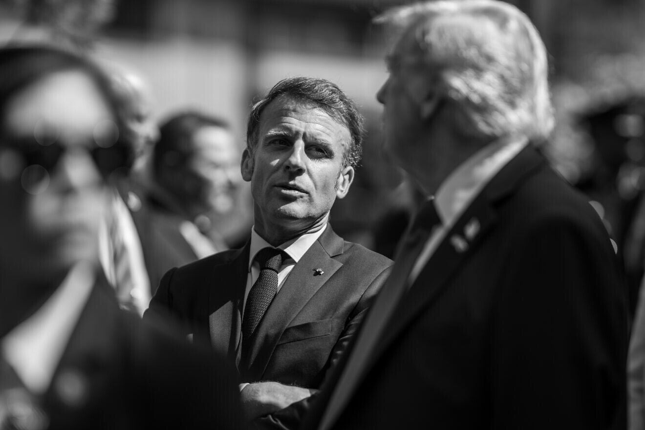 U.S. President Donald Trump talks with French President Emmanuel Macron at the G7 summit in Kananaskis, Alberta, Canada, June 16, 2025. Credit: Daniel Torok/White House.