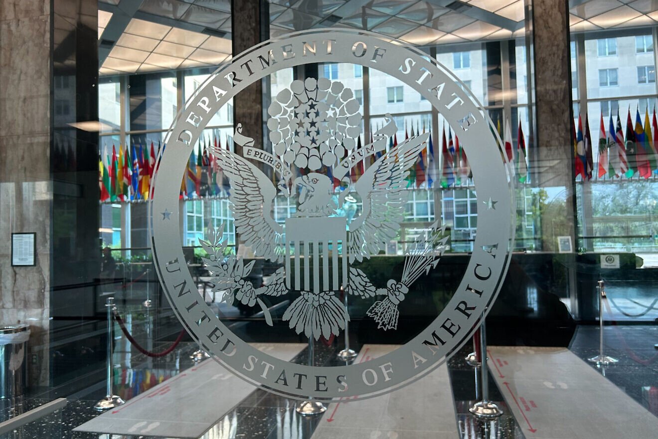 The U.S. Department of State seal is seen by the entrance to the lobby of the Harry S. Truman building in Washington, D.C., June 30, 2025. Credit: Serkan Gurbuz/U.S. State Department.
