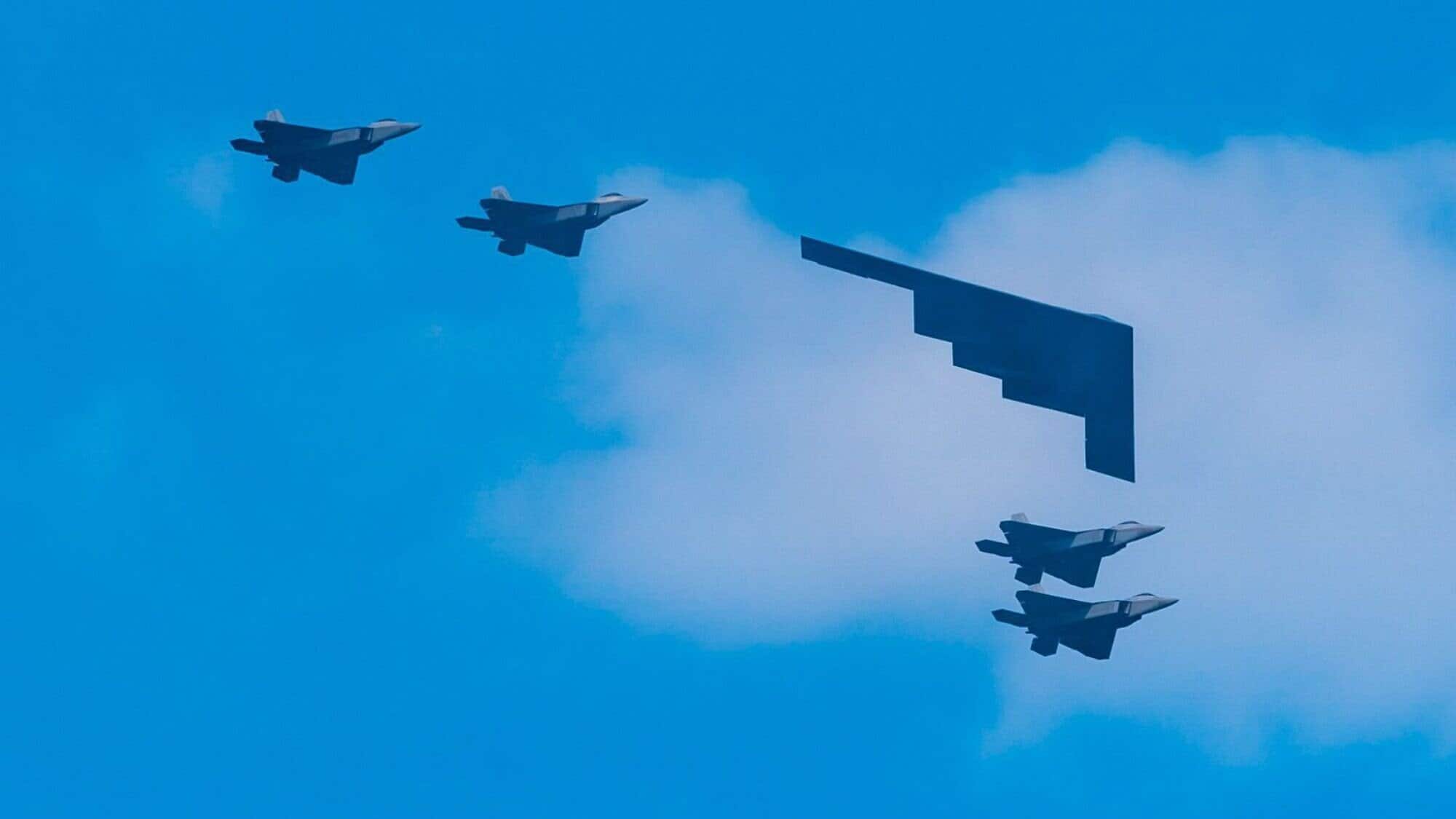 A B-2 Spirit Stealth Bomber and F-22 fighter jets during the Independence Day military flyover in Lower Manhattan, on July 04, 2020. Photo by Gotham/Getty Images.