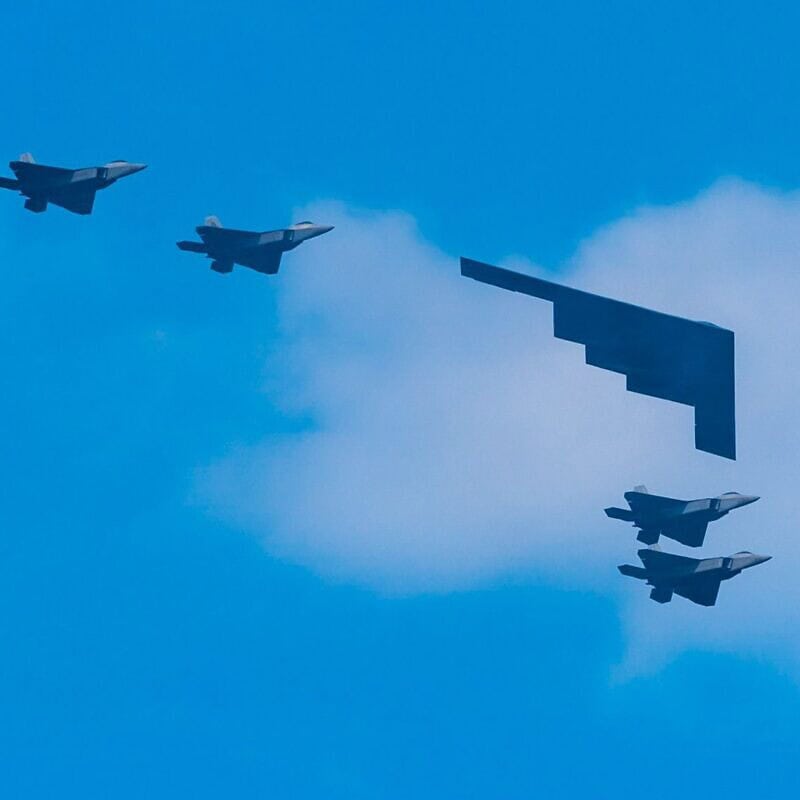 A B-2 Spirit Stealth Bomber and F-22 fighter jets during the Independence Day military flyover in Lower Manhattan, on July 04, 2020. Photo by Gotham/Getty Images.
