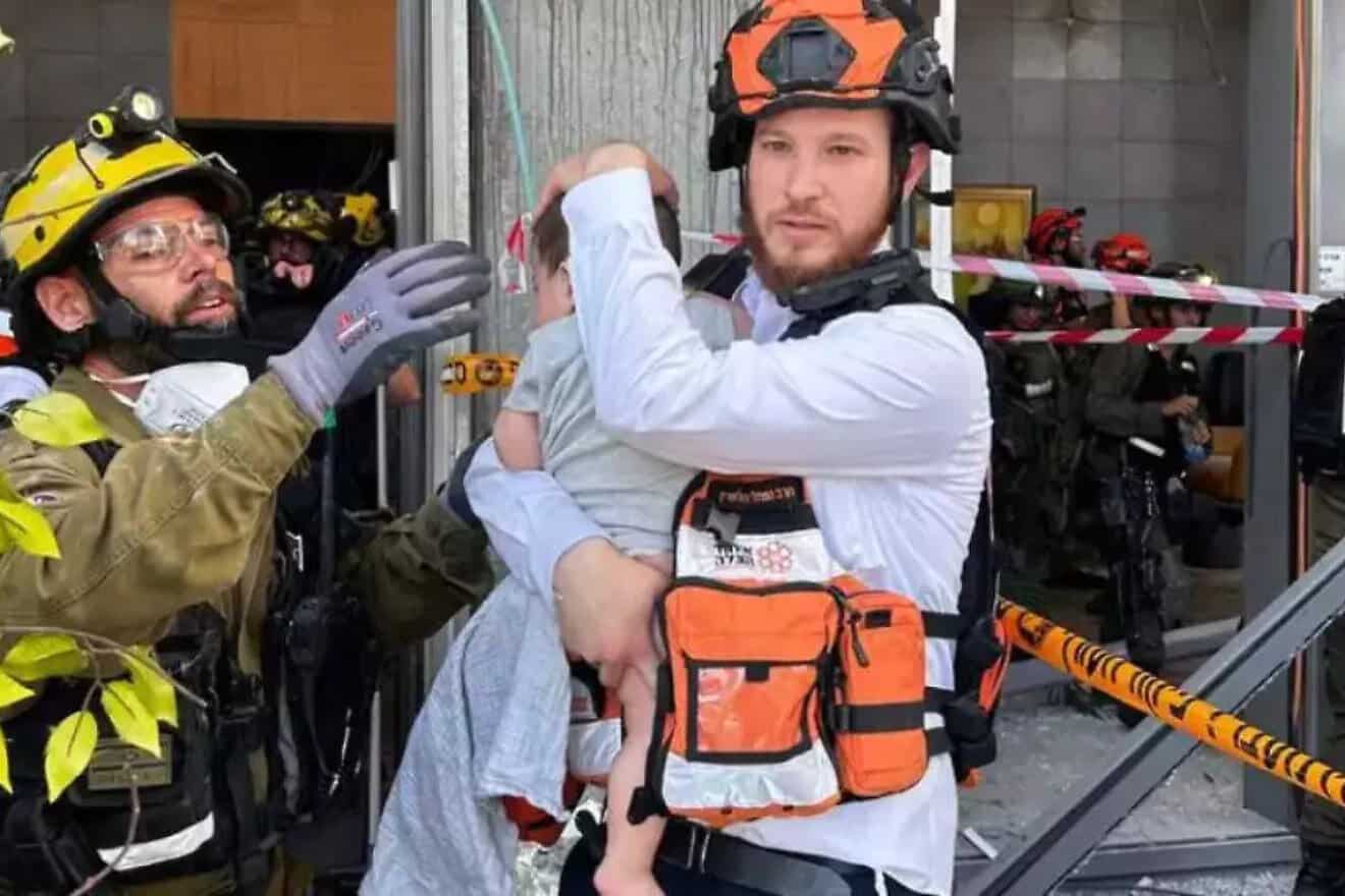 A baby boy being pulled out of the rubble in Ramat Gan, June 19, 2025. Credit: United Hatzalah.