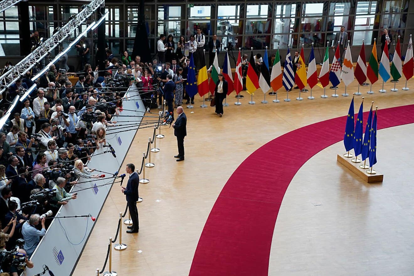 Spanish Prime Minister Pedro Sánchez (foreground) and Austrian Chancellor Christian Stocker speak with reporters at the European Council in Brussels, on June 26, 2025. Photo by Pier Marco Tacca/Getty Images.