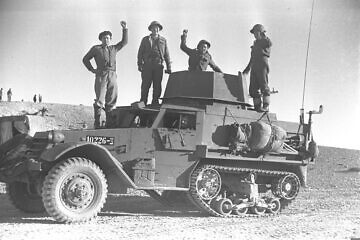Israelis cheer after a victorious battle in 1948. Credit: GPO/Government Press Office.