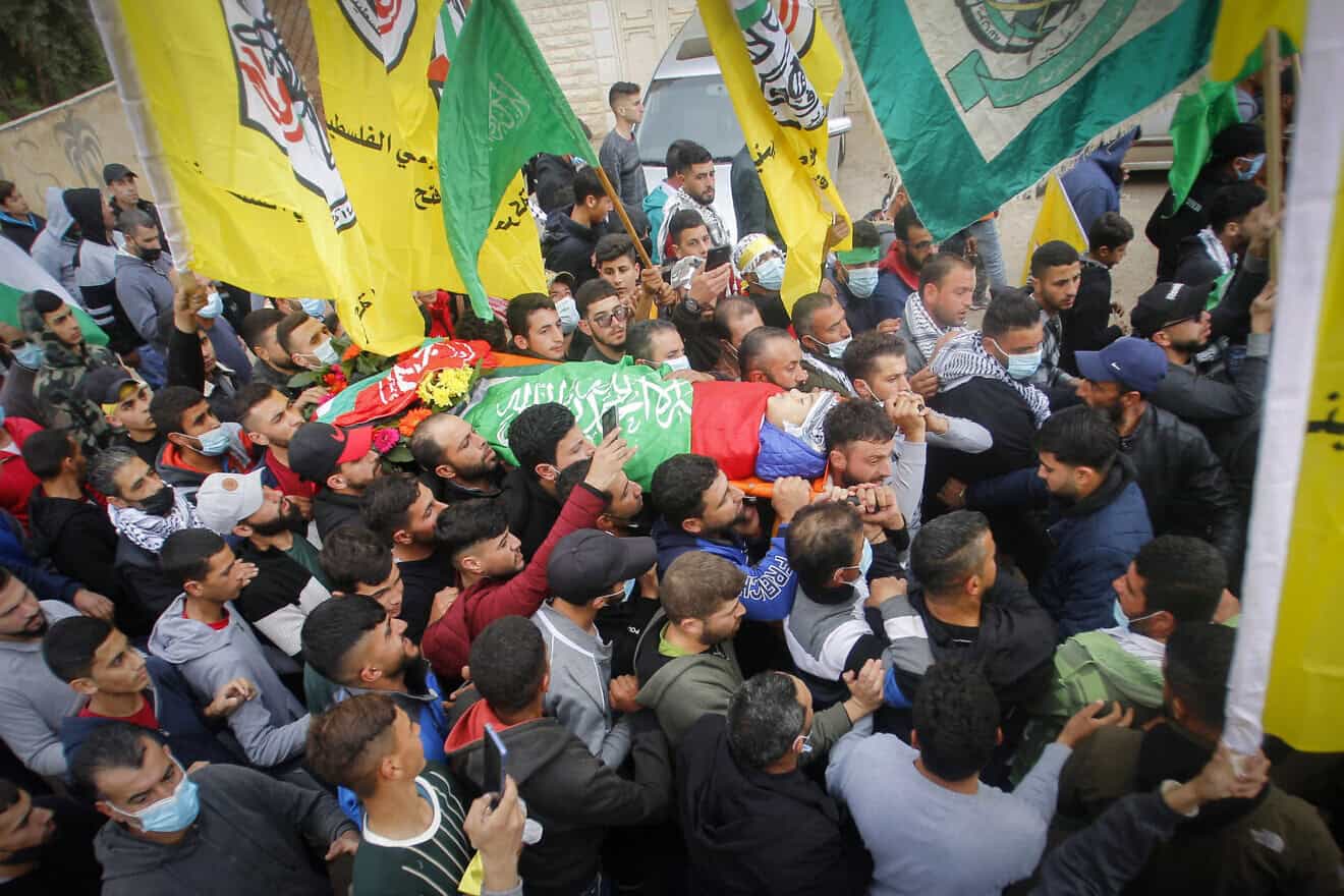 Palestinian terrorists at a funeral in Al-Mughayyir, near Ramallah in Samaria, Dec. 5, 2020. Photo by Nasser Ishtayeh/Flash90.