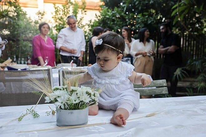 A Jewish family celebrates Shavuot on May 16, 2021. Photo by Nati Shohat/Flash90.