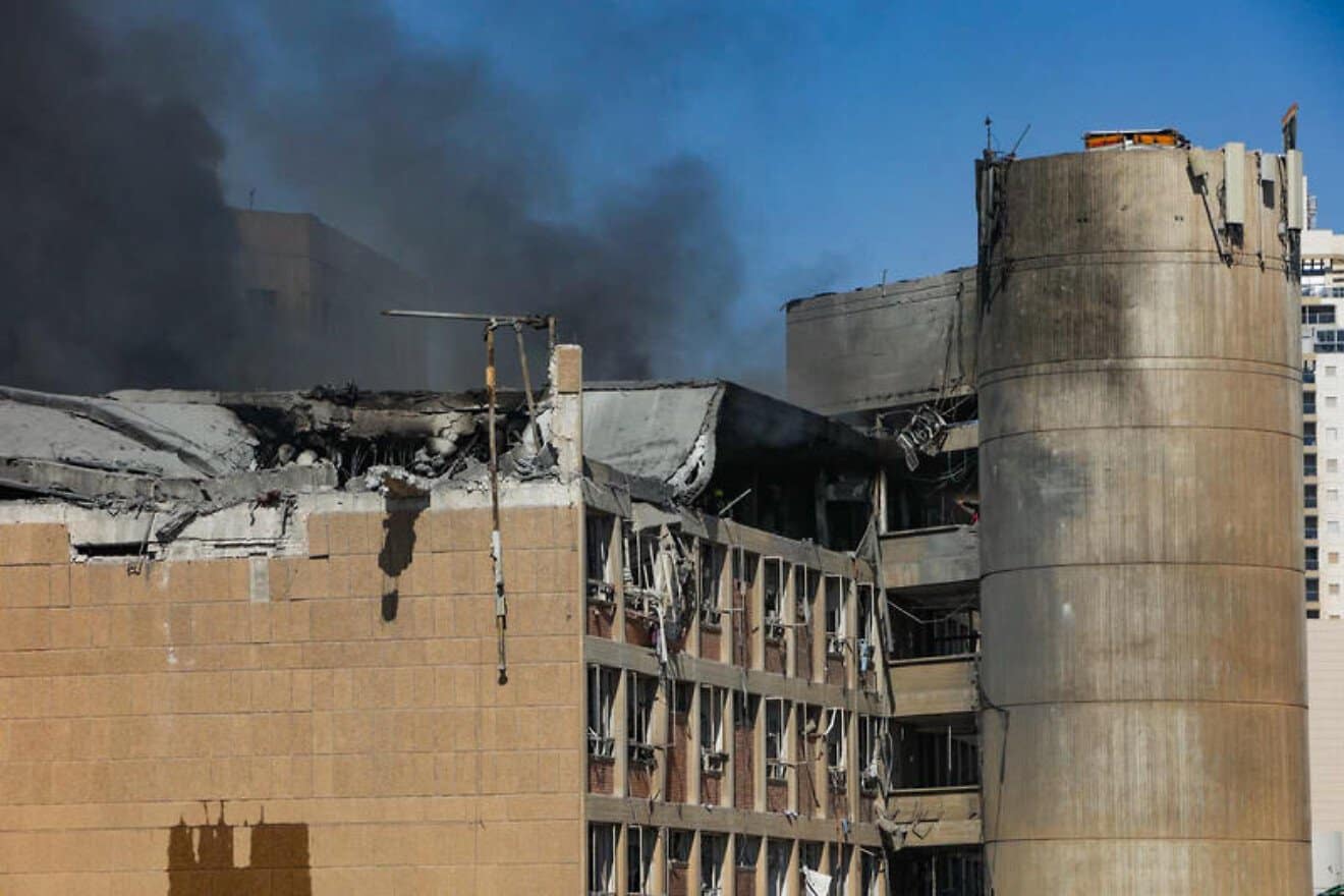 Smoke rises from the scene where a ballistic missile fired from Iran hit and caused damage at the Soroka Medical Center in Beersheva, Israel, on June 19, 2025. Photo by Dudu Greenspan/Flash90.