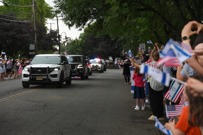 People wait for the arrival of former hostage Edan Alexander near his home in Tenafly, N.J., on June 19, 2025. Photo by Liri Agami/Flash90.