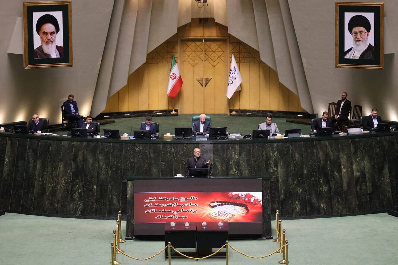 Iran's President Masoud Pezeshkian addresses members of parliament in Tehran on March 2, 2025. Photo by Atta Kenare/AFP via Getty Images.
