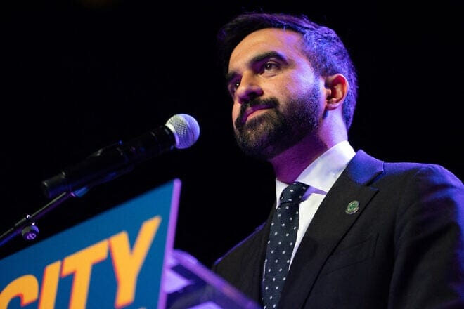 Zohran Mamdani looks out into the crowd at a rally at Brooklyn Steel in Brooklyn, N.Y., on May 4, 2025. Photo by Madison Swart/Hans Lucas/AFP via Getty Images.