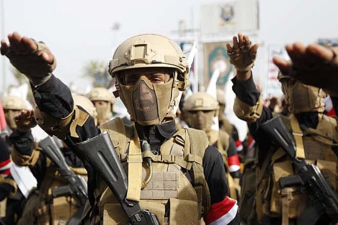 Military forces who are affiliated with Yemen's  Houthi terrorist group take part in a mass protest on May 23, 2025 in Sana'a, Yemen. Photo by Mohammed Hamoud/Getty Images.
