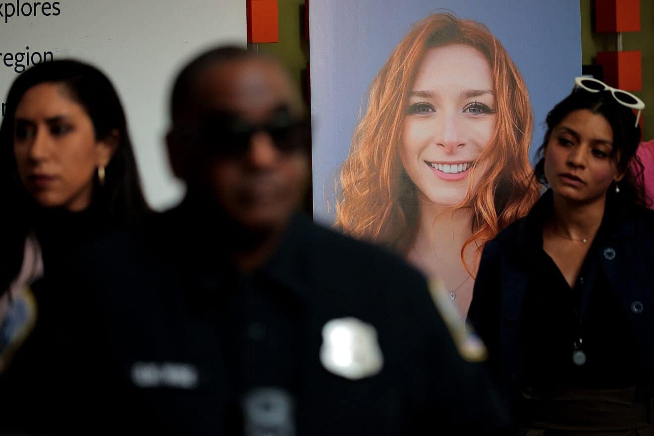 Guests gather near a photograph of Sarah Lynn Milgrim during a remembrance and reopening ceremony at the Lillian and Albert Small Capital Jewish Museum in Washington, D.C., on May 29, 2025. Photo by Chip Somodevilla/Getty Images.