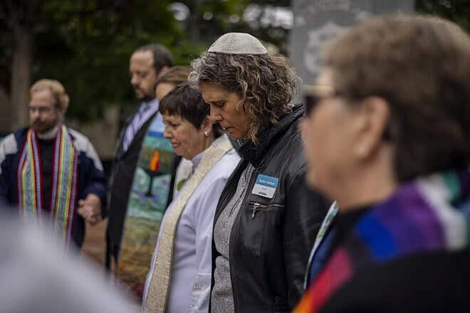 Local faith leaders and members of the community conduct a prayer vigil for the victims of a fire attack outside the Boulder County Courthouse in Colorado on June 3, 2025. Photo by Chet Strange/Getty Images.