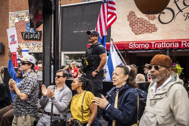 Police stand guard as attendees watch on during the Boulder Jewish Festival on June 8, 2025 in Boulder, Colorado. On June 1, Mohamed Soliman allegedly threw Molotov cocktails at a group participating in an organized walk to show solidarity with hostages held by Hamas in Gaza, wounding 15 people. Soliman was charged with 118 counts of assault, including 28 counts of attempted murder. Photo by Chet Strange/Getty Images.