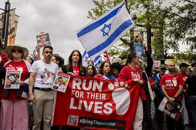 Run for Their Lives hosts a march in honor of people kidnapped in Gaza on June 8, 2025, in Boulder, Colorado, where a week earlier  Mohamed Soliman threw incendiary devices at a group participating in an organized walk to show solidarity with hostages held by Hamas, injuring 15 people. Photo by Chet Strange/Getty Images.