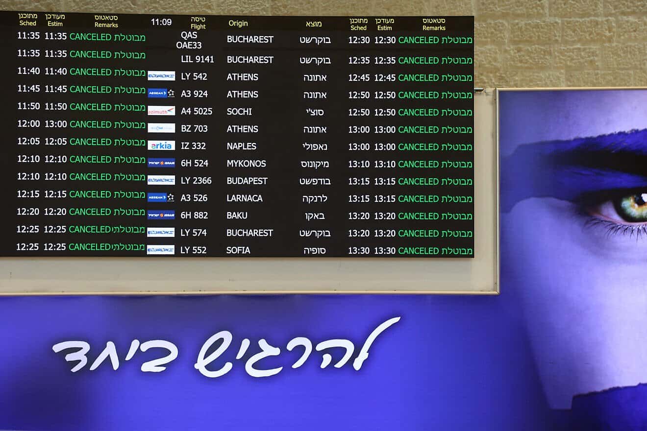 A board showing cancelled flights stands at arrivals hall after Israel closed its airspace, at Ben Gurion Airport near Tel Aviv, on June 13, 2025. Photo by Gil Cohen-Magen/AFP via Getty Images.