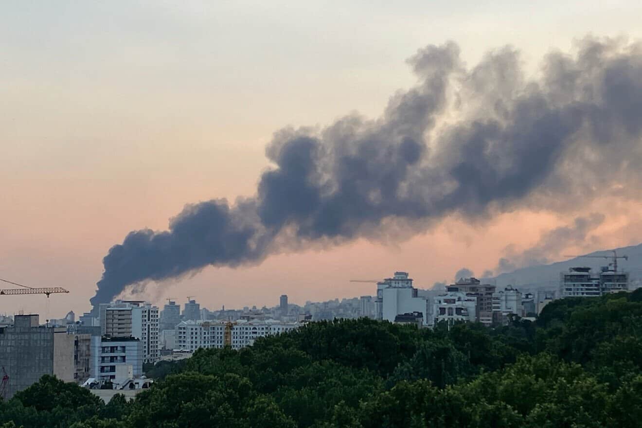 Smoke billows from an explosion at the Islamic Republic of Iran Broadcasting building in Tehran, on June 16, 2025. Photo by AFP via Getty Images.