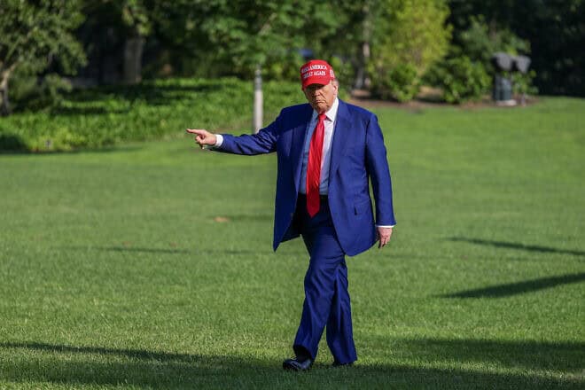 U.S. President Donald Trump points to a new flag on the south lawn of the White House on June 21, 2025 in Washington, DC. Photo by Tasos Katopodis/Getty Images.