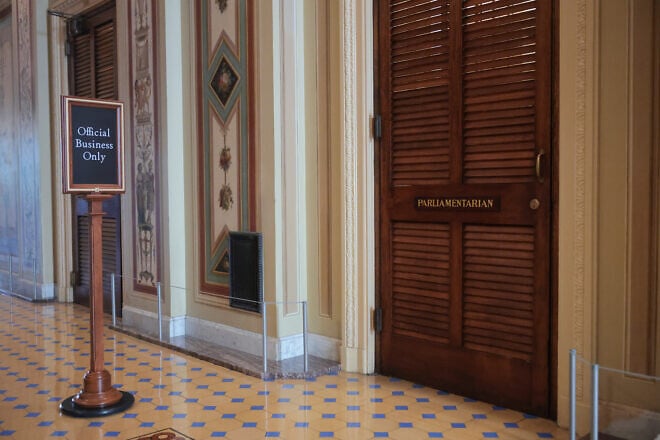 The doors to the Senate parliamentarian's office as the Senate Finance Committee began its review of U.S. President Donald Trump's “One Big Beautiful Bill" Act in the U.S. Capitol in Washington, D.C., on June 23, 2025. Credit: Kayla Bartkowski/Getty Images.