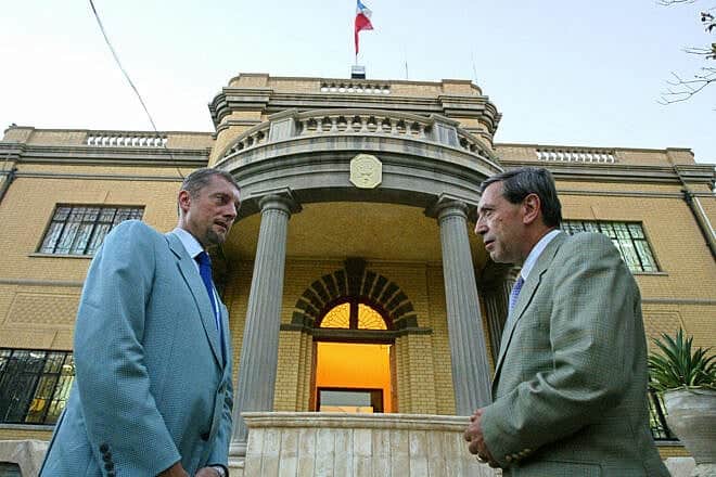 Former French Ambassador to Iraq Bernard Bajolet (left) and then envoy Hubert Colin de Verdiere in front of the French embassy in Baghdad, on Aug. 30, 2004. Photo by Karim Sahib/AFP via Getty Images.