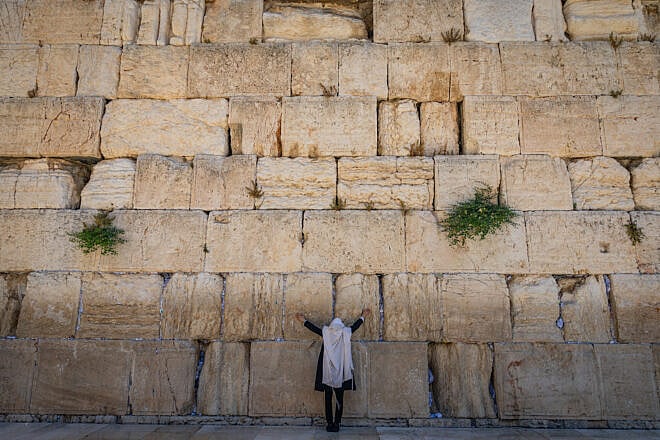 Praying at the Western Wall in the Old City of Jerusalem, after the entrance was closed following an Israeli attack on Iran, June 13, 2025. Photo by Yonatan Sindel/Flash90.