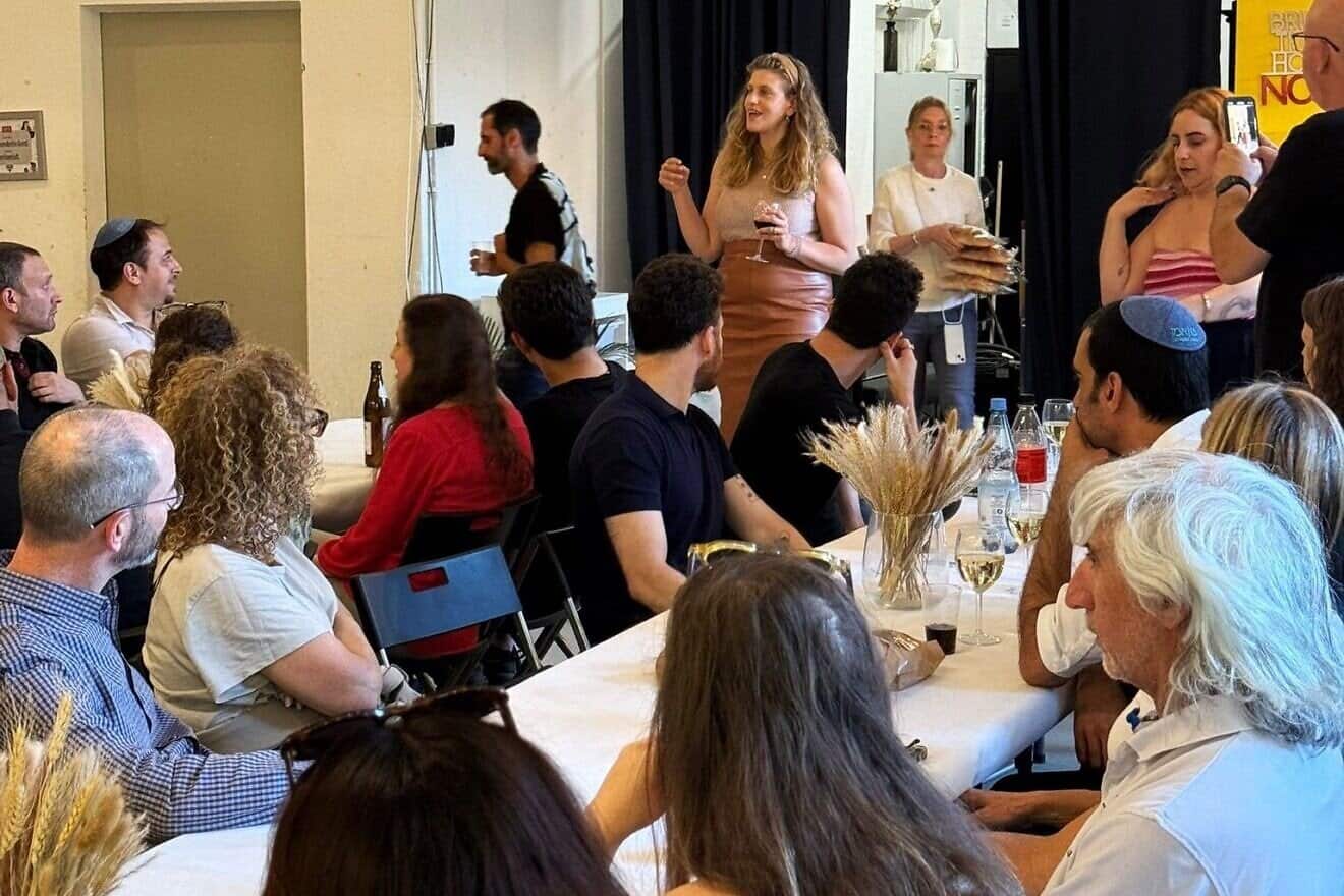Israelis stranded in Europe during the 12-day war with Iran gather before the start of a Shabbat dinner in Berlin, June 2025. Credit: Courtesy of the JDC.