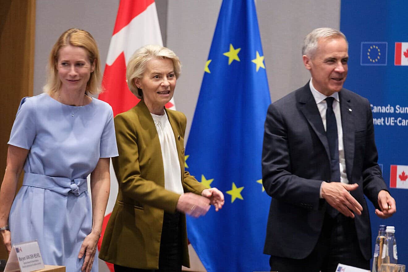 EU foreign policy chief Kaja Kallas (left) and European Commission President Ursula von der Leyen welcome Canadian Prime Minister Mark Carney before an EU-Canada Summit in Brussels, on June 23, 2025. Photo by Thierry Monasse/Getty Images.