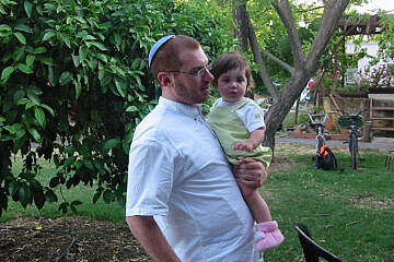 Meir Dana-Picard in Kfar Darom, 20 years ago, with his then-1-year-old daughter. Credit: Courtesy of Meir Dana-Picard.
