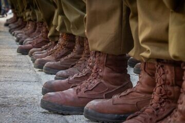 Soldiers in the Netzah Yehuda Battalion, a Haredi unit, and family members attend a swearing-in ceremony at the Western Wall in Jerusalem's Old City on July 10, 2024. Photo by Chaim Goldberg/Flash90.