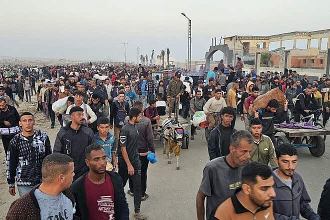 Palestinians return from a food distribution center in Rafah, the southern Gaza Strip, on June 1, 2025. Photo by AFP via Getty Images.