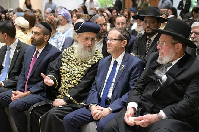 Israeli President Isaac Herzog seated between Sephardic Chief Rabbi David Yosef and Ashkenazi Chief Rabbi Kalman Ber at the President's Residence in Jerusalem, June 10, 2025.
Credit: Amos Ben-Gershom (GPO).