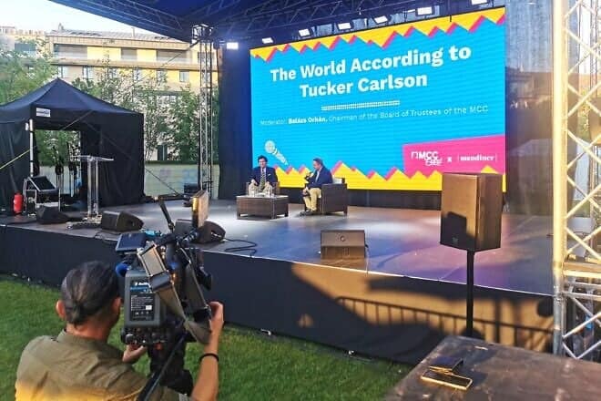 “The World According to Tucker Carlson,” MCC Fest After, Millenáris, Central Europe, Aug. 22, 2023. Credit: Elekes Andor via Wikimedia Commons.