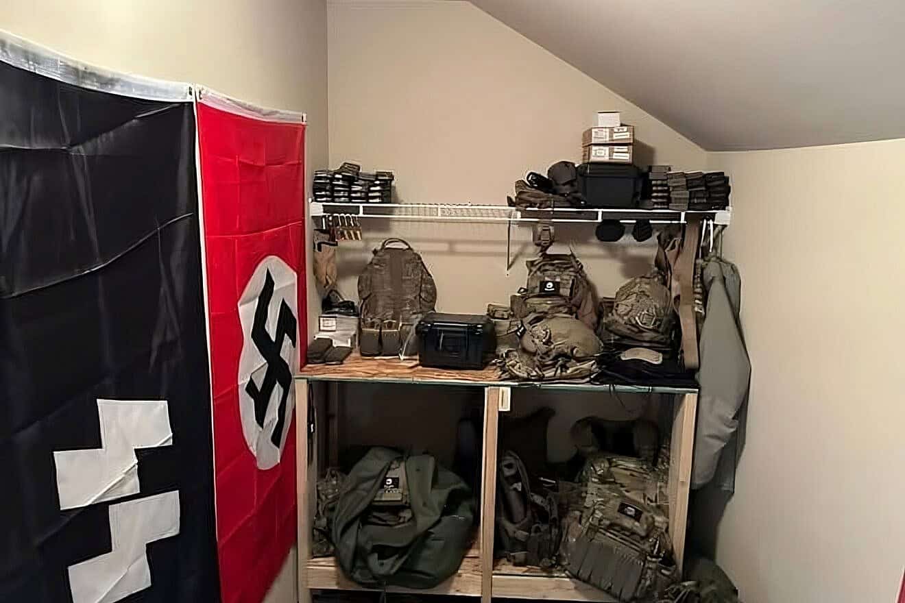 Explosives, body armor, ammunition and ballistic helmets surrounded by Nazi paraphernalia found during an FBI raid of a residence in Lacey, Wash., June 2, 2025. Credit: Courtesy of The Thurston County Sheriff's Office.