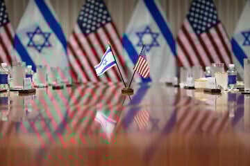 Flags fly at a meeting between U.S. Secretary of Defense Lloyd J. Austin III and Israeli Defense Minister Yoav Gallant at the Pentagon, on March 26, 2024. Photo by U.S. Navy Petty Officer 1st Class Alexander Kubitza, Department of Defense.