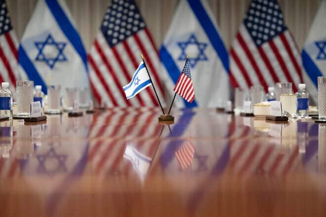 Flags fly at a meeting between U.S. Secretary of Defense Lloyd J. Austin III and Israeli Defense Minister Yoav Gallant at the Pentagon, on March 26, 2024. Photo by U.S. Navy Petty Officer 1st Class Alexander Kubitza, Department of Defense.