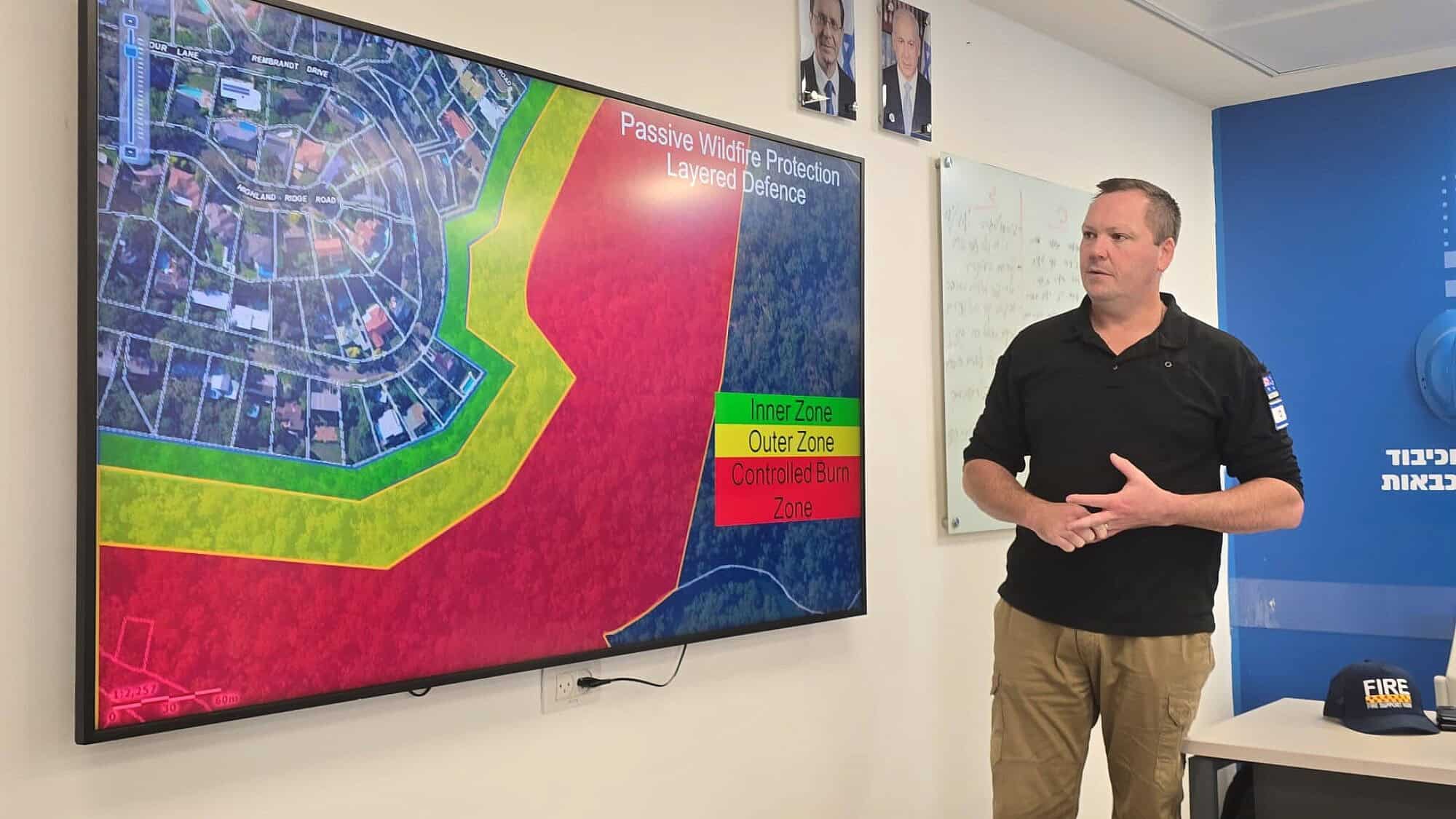 Timothy Wainwright instructs local firefighters in Israel on his methods of battling blazes. Credit: Courtesy of Timothy Wainwright/Operation Fire Support.