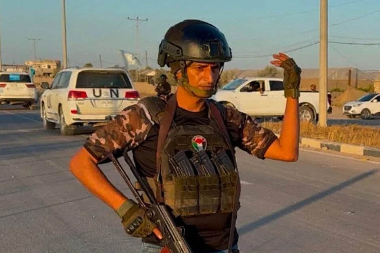 Yasser Abu Shabab is seen holding a gun in this image posted on the Popular Forces’ Facebook page. Credit: Popular Forces/Facebook.