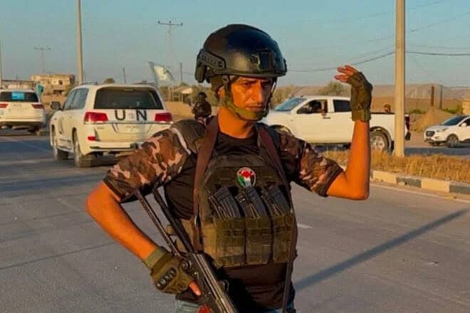 Yasser Abu Shabab is seen holding a gun in this image posted on the Popular Forces’ Facebook page. Credit: Popular Forces/Facebook.