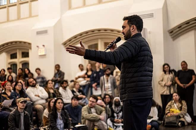 State assemblyman Zohran Mamdani (D-N.Y.) speaking at a DSA 101 meeting at the Church of the Village in the Manhattan borough of New York City, on Nov. 11, 2024. Credit: Bingjiefu He via Wikimedia Commons.