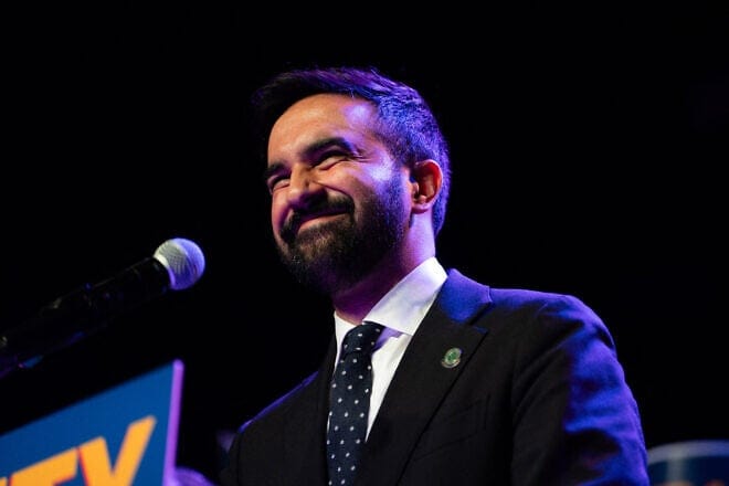 Zohran Mamdani speaks during his first major mayoral campaign rally at Brooklyn Steel in Brooklyn, N.Y., on May 2 2025. Photo by Madison Swart/Hans Lucas/AFP via Getty Images.