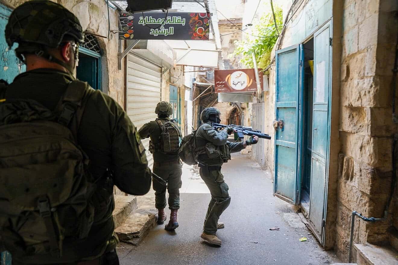 Israeli forces conduct a counterterrorism operation in the Kasbah of Nablus, searching structures and apprehending suspects as part of Operation Iron Walls. Credit: IDF.