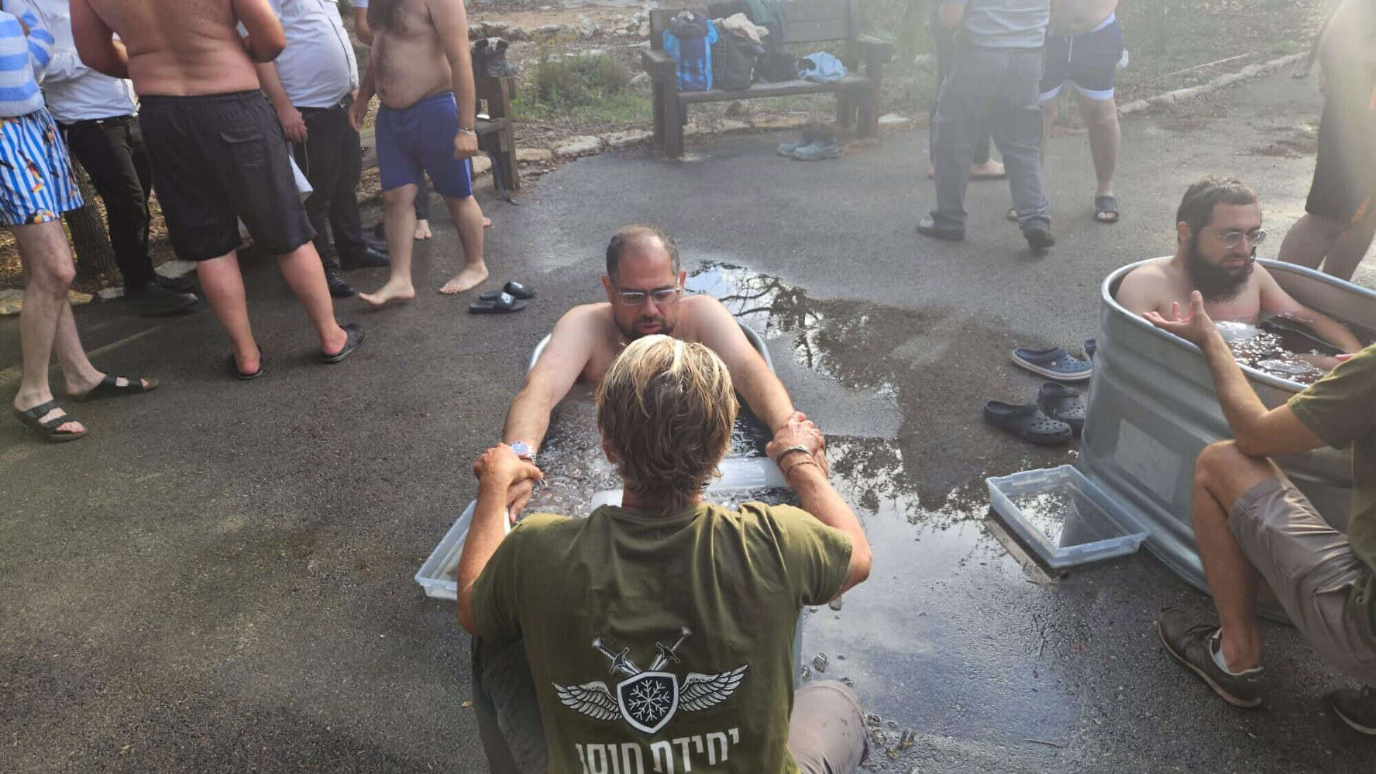ZAKA volunteers experience cold plunge therapy at a retreat in Israel on July 1, 2025. Credit: ZAKA.