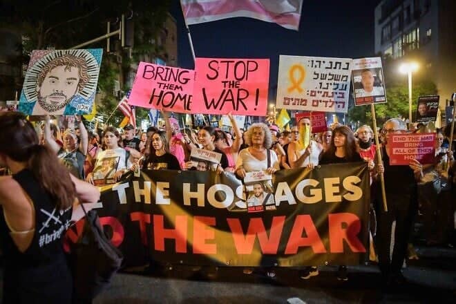 Families of hostages, former hostages and their supporters march to the U.S. embassy branch in Tel Aviv, calling for the release of the remaining 50 hostages still being held by Hamas in the Gaza Strip, July 26, 2025. Photo by Avshalom Sassoni/Flash90.