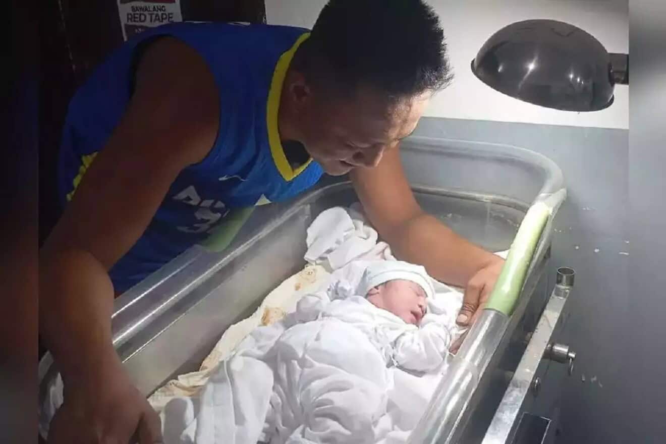 Filipino captivity survivor Jimmy (Galinor) Pacheco with his newborn daughter Israela. Photo: Courtesy.