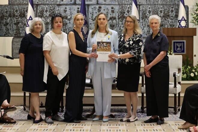 Members of the Dinah Project present their report to Israel's first lady Michal Herzog, July 2025. Photo by Itzik Biran.